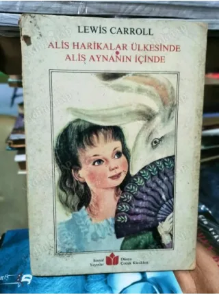 Alis Harikalar Ülkesinde * Alis Aynanın İçinde Çev: Tomris Uyar Nihal Yeğinobalı 2 Kitap