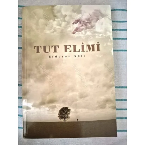 Tut Elimi (imzalı ithaflı)